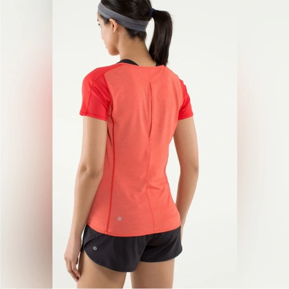 Lululemon Run Fast Track Short‎ Sleeve Shirt. Open in Back. Orange. Women 6/8